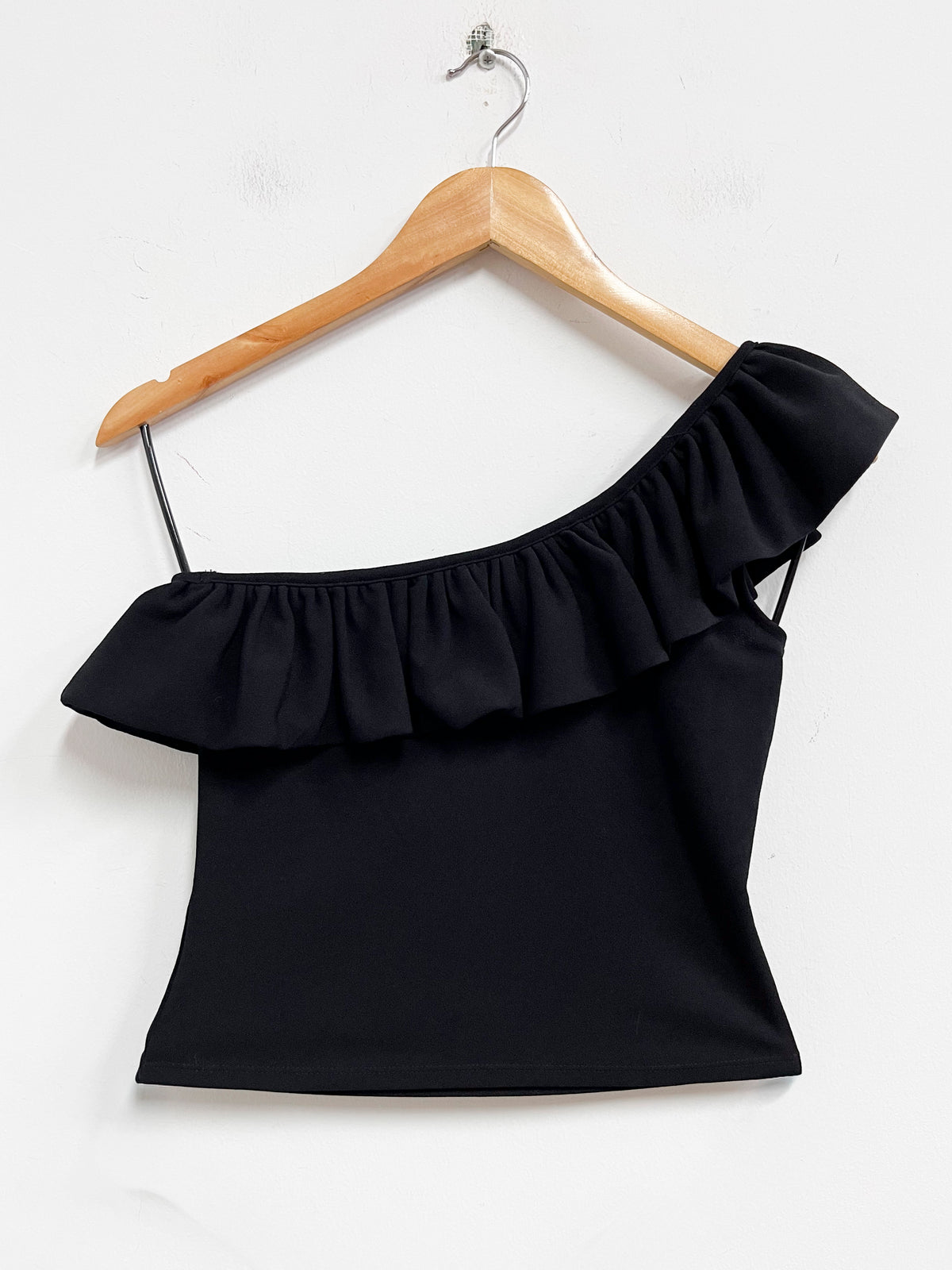 Top negro asimétrico con bobos - HyM - Talla S