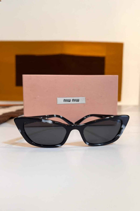 Lentes negros - Miu Miu