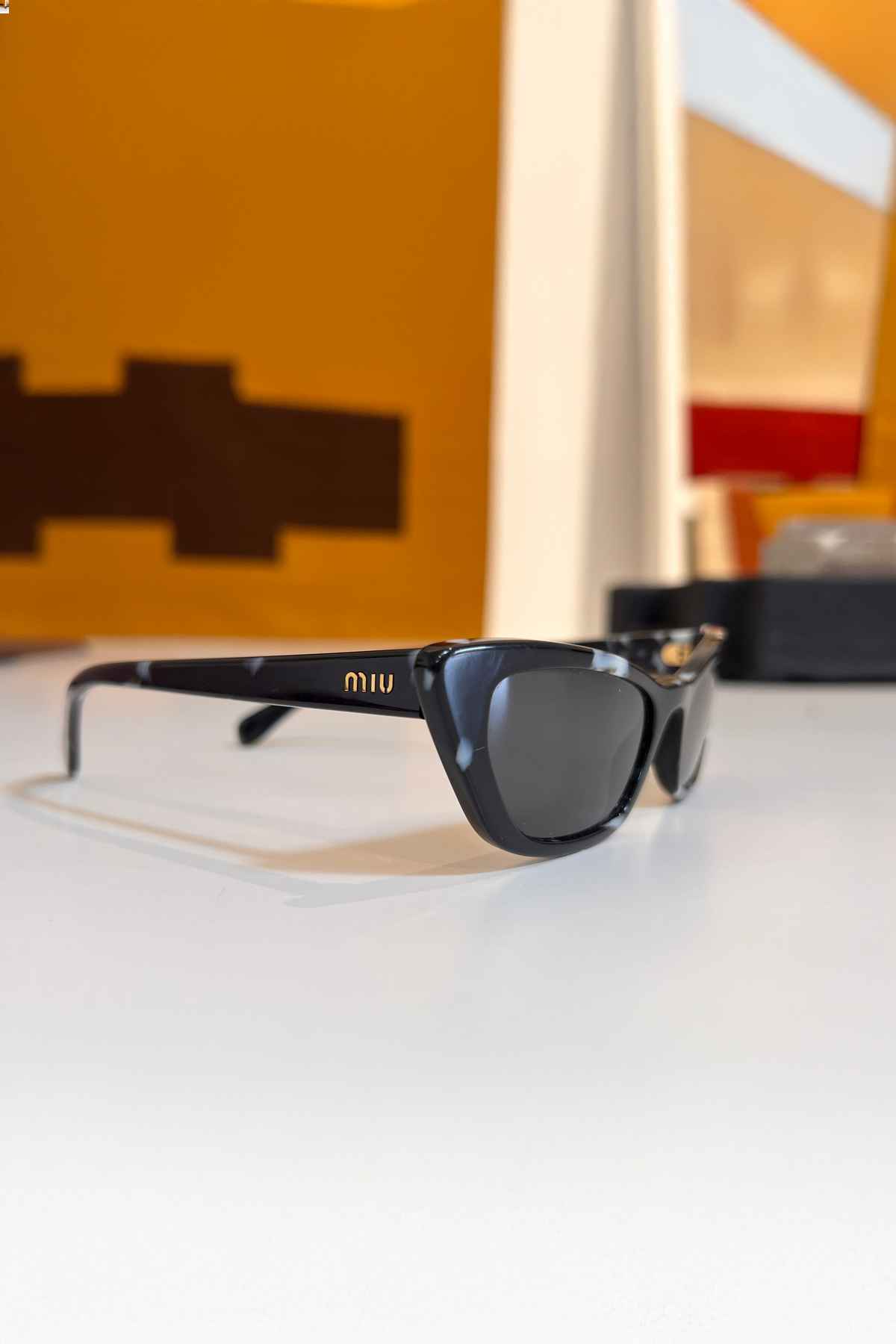 Lentes negros - Miu Miu